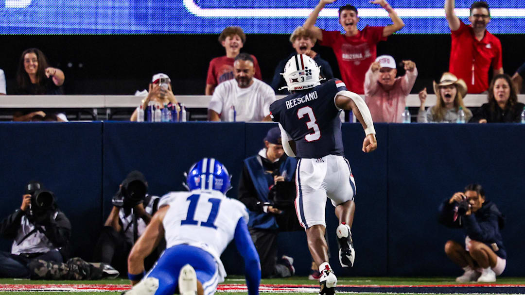 Oct 11, 2025; Tucson, Arizona, USA; Arizona Wildcats running back Kedrick Reescano (3) runs a touchdown in the fourth quarter of the game against the Brigham Young Cougars at Arizona Stadium. Mandatory Credit: Aryanna Frank-Imagn Images