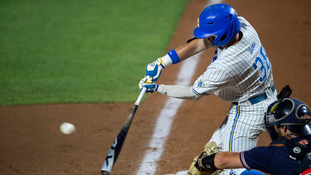 UCLA Bruins outfielder Jake Palmer (38) swings at the ball as Auburn Tigers take on UCLA Bruins during the NCAA regional baseball tournament at Plainsman Park in Auburn, Ala., on Sunday, June 5, 2022.