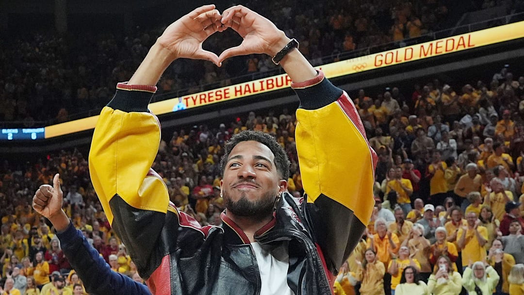 Former Iowa State and Indiana Packer guard Tyrese Haliburton shows heart sign as the unveiling his Olympic 24 gold made banner during the halftime of Cyclones and Wildcats men’s basketball showdown at Hilton Coliseum on Saturday March 1, 2025 in Ames, Iowa.