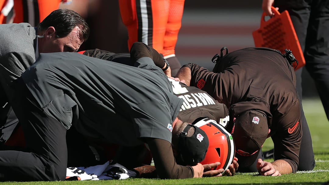Cleveland Browns quarterback Deshaun Watson is checked on by medical staff after an injury during a game against the Cincinnati Bengals on Oct. 20, 2024, in Cleveland, Ohio.