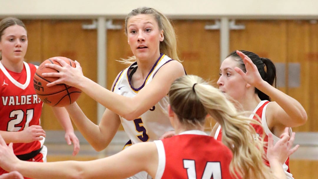 Sheboygan Falls' Addison Schliewe (5) looks to pass the ball against Valders at Falls, Tuesday, January 14, 2025, in Sheboygan Falls, Wis. The Falcons are on a roll and join the Top 25.