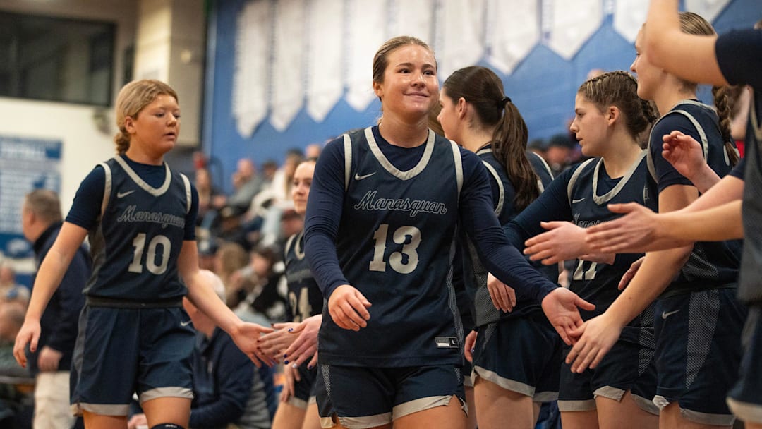 Girls basketball Shore Conference Tournament quarterfinals takes place at Holmdel High School on Saturday, February 14, 2026, in Holmdel, New Jersey. Manasquan’s Shannon Looney and Jordan Hollawell celebrate with the bench late in the Howell vs Manasquan game. Girls basketball Shore Conference Tournament quarterfinals takes place at Holmdel High School on Saturday, February 14, 2026, in Holmdel, New Jersey. Manasquan’s Shannon Looney and Jordan Hollawell celebrate with the bench late in the Howell vs Manasquan game.