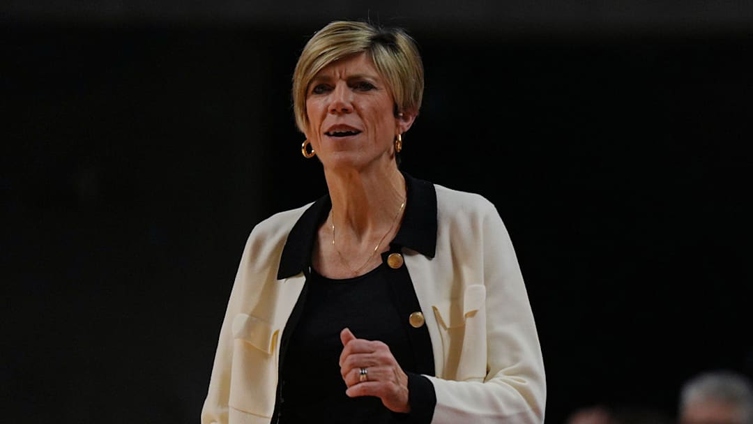 Iowa Hawkeyes women' basketball head coach Jan Jensen watches during the first quarter against Iowa State in the NCAA women’s basketball Cy-Hawk Series on Dec. 10, 2025, at Hilton Coliseum in Ames, Iowa.