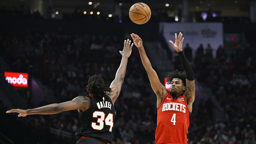 Apr 12, 2024; Portland, Oregon, USA; Houston Rockets guard Jalen Green (4) shoots a jump shot during the first half against Portland Trail Blazers forward Jabari Walker (34) at Moda Center Apr 12, 2024; Portland, Oregon, USA; Houston Rockets guard Jalen Green (4) shoots a jump shot during the first half against Portland Trail Blazers forward Jabari Walker (34) at Moda Center