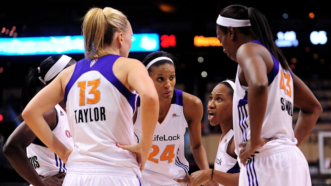 Sep 25, 2011; Phoenix, AZ, USA; Phoenix Mercury forward Penny Taylor (13) , guard DeWanna Bonner (24) , guard Temeka Johnson (2) , and forward Nakia Sanford (43) huddle on the court while playing against the Minnesota Lynx during the second half at the US Airways Center.  The Lynx defeated the Mercury 103-86. Mandatory Credit: Jennifer Stewart-Imagn Images