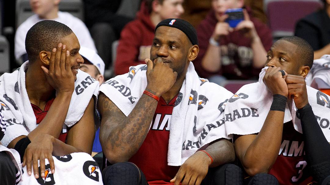 Feb 11, 2011; Auburn Hills, MI, USA; Miami Heat power forward Chris Bosh (left), small forward LeBron James (center), and shooting guard Dwyane Wade (3) sit on the bench in the fourth quarter of an NBA game at The Palace. Miami defeated Detroit 106-92. Mandatory Credit: Rick Osentoski-USA TODAY Sports Feb 11, 2011; Auburn Hills, MI, USA; Miami Heat power forward Chris Bosh (left), small forward LeBron James (center), and shooting guard Dwyane Wade (3) sit on the bench in the fourth quarter of an NBA game at The Palace. Miami defeated Detroit 106-92. Mandatory Credit: Rick Osentoski-USA TODAY Sports