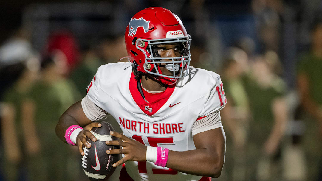 North Shore quarterback Kaleb Bailey rolls out of the pocket.