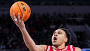 Wisconsin Badgers guard John Tonje (9) goes up for a basket Saturday, March 15, 2025, in a semifinals game at the 2025 TIAA Big Ten Men’s Basketball Tournament between the Michigan State Spartans and the Wisconsin Badgers at Gainbridge Fieldhouse in Indianapolis. The Wisconsin Badgers defeated the Michigan State Spartans, 77-74.