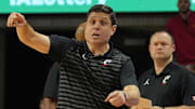 Cincinnati Bearcats' men's basketball head coach Wes Miller reacts from the bench during the second half against Iowa State in the Big-12 men’s basketball at Hilton Coliseum on Feb. 15, 2025 in Ames, Iowa.
