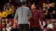 Dec 1, 2024; Minneapolis, Minnesota, USA; Bethune-Cookman Wildcats head coach Reggie Theus and Minnesota Golden Gophers head coach Ben Johnson shake hands after the game at Williams Arena. Mandatory Credit: Matt Krohn-Imagn Images