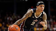 Dec 21, 2024; Minneapolis, Minnesota, USA; Fairleigh Dickinson Knights guard Terrence Brown (2) dribbles during the second half against the Minnesota Golden Gophers at Williams Arena. Mandatory Credit: Matt Krohn-Imagn Images