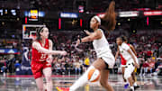 May 17, 2025; Indianapolis, IN, USA;  Indiana Fever guard Caitlin Clark (22) passes around Chicago Sky forward Angel Reese (5) on Saturday, May 17, 2025, during a game between the Indiana Fever and the Chicago Sky at Gainbridge Fieldhouse in Indianapolis. The Indiana Fever defeated the Chicago Sky, 93-58.Mandatory Credit: Grace Smith-IndyStar via Imagn Images