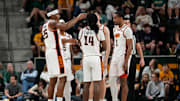 Mar 1, 2025; Waco, Texas, USA;  The Oklahoma State Cowboys huddle during a break in play against the Baylor Bears during the first half at Paul and Alejandra Foster Pavilion. Mandatory Credit: Chris Jones-Imagn Images