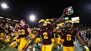 Arizona State Sun Devils wide receiver Brandon Aiyuk (2) holds-up the Territorial Cup trophy after defeating Arizona 24-14 at the 93rd Duel in the Desert on Nov. 30, 2019 in Tempe, Ariz.

Arizona Wildcats Vs Arizona State Sun Devils
