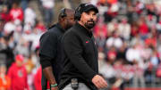 Ohio State Buckeyes head coach Ryan Day looks to the scoreboard