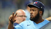 Toronto Blue Jays first baseman Vladimir Guerrero Jr. (27) waives to fans between inning against the Miami Marlins at loanDepot Park on Aug 22. 