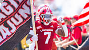 Elijah Davis 7 takes the field as the Louisiana Ragin Cajuns take on Tulane atbCajun Field. Saturday, Sept. 21, 2024.