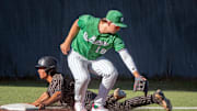 Archbishop Mitty's Mason Manglicmot slides safely at third under the St. Mary's Rolen Reyes' tag during the 2024 CIF NorCal Baseball Division I semifinal at St. Mary's in Stockton on May 30, 2024. St. Mary's won 7-6.