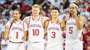Indiana's Myles Rice (1), Luke Goode (10), Anthony Leal (3) and Malik Reneau (5) watch Trey Galloway (32) shoot a free throw during the Indiana versus Purdue mens basketball game at Simon Skjodt Assembly Hall on Sunday, Feb. 23, 2025.
