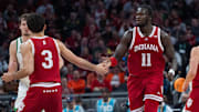 Indiana guard Anthony Leal (3) gives a high five to center Oumar Ballo (11) against Oregon during the Big Ten Tournament at Gainbridge Fieldhouse in Indianapolis.