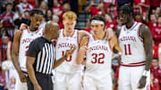 Indiana's Trey Galloway (32) talks with a referee during the Indiana versus Illinois men's basketball game at Simon Skjodt Assembly Hall on Tuesday, Jan. 14, 2025.