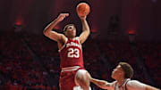 Indiana Hoosiers forward Trayce Jackson-Davis (23) goes to the basket over Illinois Fighting Illini forward Coleman Hawkins (33) during the second half at State Farm Center.