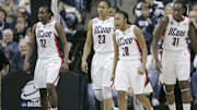 Mar 22, 2009; Storrs, CT, USA; Connecticut Huskies (L-R) guard Kalana Greene (32), forward Maya Moore (23), guard Renee Montgomery (20) and center Tina Charles (31) return to their bench during a timeout as they take on the Vermont Catamounts during the second half of the first round in the 2009 NCAA womens basketball tournament at Gampel Pavilion. UConn defeated Vermont 104-65. Mandatory Credit: David Butler II-Imagn Images