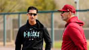 Arizona Diamondbacks general manager Mike Hazen talks to manager Torey Lovullo during spring training workouts at Salt River Fields in Scottsdale on Feb. 17, 2023.