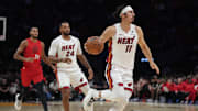 Nov 8, 2025; Miami, Florida, USA;  Miami Heat forward Jaime Jaquez Jr. (11) brings the ball up the court against the Portland Trail Blazers in the first quarter at Kaseya Center. Mandatory Credit: Jim Rassol-Imagn Images
