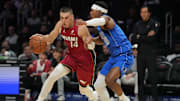 Nov 24, 2025; Miami, Florida, USA; Miami Heat guard Tyler Herro (14) drives to the basket as Dallas Mavericks guard Brandon Williams (10) defends during the first half at Kaseya Center. Mandatory Credit: Jim Rassol-Imagn Images