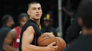 Nov 24, 2025; Miami, Florida, USA; Miami Heat guard Tyler Herro (14) warms-up before the game against the Dallas Mavericks at Kaseya Center. Mandatory Credit: Jim Rassol-Imagn Images