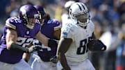 Tennessee Titans tight end Delanie Walker (82) carries the ball as Minnesota Vikings free safety Harrison Smith (22) defends at Nissan Stadium in Nashville, Tenn., on Sept. 11, 2016.