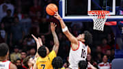 Nov 29, 2025; Tucson, Arizona, USA; Arizona Wildcats forward Koa Peat (10) blocks a shot by Norfolk State Spartans guard Anthony McComb III (7) during the second half at McKale Memorial Center. Mandatory Credit: Aryanna Frank-Imagn Images