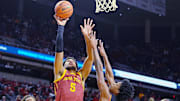 Iowa State Cyclones forward  (5) shoots the ball around Grambling State Tiger forward Jimel Lane (5) during the first half on Nov. 6, 2025, at Hilton Coliseum in Ames, Iowa.
