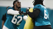 Jacksonville Jaguars offensive tackle Javon Foster (62) goes up against offensive lineman Steven Jones during drills at Friday's rookie minicamp. The Jacksonville Jaguars held their first day of rookie minicamp inside the covered field at the Jaguars performance facility in Jacksonville, Florida Friday, May 10, 2024.