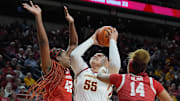 Iowa State Cyclones' center Audi Crooks (55) shoots the ball between Houston Cougars forward Peyton McFarland (42) and guard Laila Blair (14) during the second quarter in the Big-12 women’s basketball at Hilton Coliseum on Wednesday, Feb19, 2025, in Ames, Iowa.