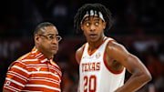 Texas Longhorns head coach Rodney Terry speaks with guard Tre Johnson (20) during a break in the second half of the Longhorns' game against the Chicago State Cougars at the Moody Center in Austin, Nov. 12, 2024.