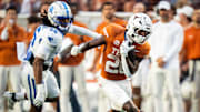 Texas Longhorns running back Quintrevion Wisner (26) carries the ball for Texas in the third quarter of the Texas Longhorns' game against the Kentucky Wildcats at Darrell K Royal Texas Memorial Stadium in Austin, Nov. 23, 2024.