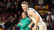 Dec 4, 2024; Minneapolis, Minnesota, USA; Michigan State Spartans guard Gehrig Normand (7) celebrates his three-point basket against the Minnesota Golden Gophers during the second half at Williams Arena. Mandatory Credit: Matt Krohn-Imagn Images
