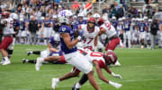 Holy Cross's Jalen Coker hauls in a pass for a touchdown versus Colgate University on Saturday.