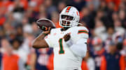 Nov 30, 2024; Syracuse, New York, USA; Miami Hurricanes quarterback Cam Ward (1) passes the ball against the Syracuse Orange during the first half at the JMA Wireless Dome. Mandatory Credit: Rich Barnes-Imagn Images