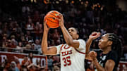 Madison Booker shoots during No. 4 Texas's 66–62 win over No. 2 South Carolina on Feb. 9, 2025.