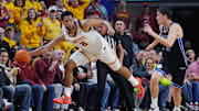 Iowa State Cyclones forward Joshua Jefferson (2) passes the ball around BYU Cougars's guard Egor Demin (3) during the second-over-time game in the Big-12 men’s basketball in the Senior Day at Hilton Coliseum on March 4, 2025, in Ames, Iowa.