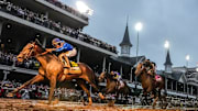 Sovereignty runs past Journalism in the 151st Kentucky Derby at Churchill Downs.
