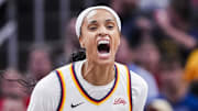 DeWanna Bonner celebrates during a game between the Fever and Mystics.
