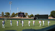 Players warm up for batting practice at Arizona Fall League media day at Scottsdale Stadium during media day on Oct. 4, 2024, in Scottsdale, Arizona.