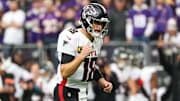 Dec 8, 2024; Minneapolis, Minnesota, USA; Atlanta Falcons quarterback Kirk Cousins (18) celebrates running back Tyler Allgeier's (25) touchdown against the Minnesota Vikings during the first quarter at U.S. Bank Stadium. Mandatory Credit: Matt Krohn-Imagn Images
