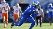 Kentucky Wildcats wide receiver Barion Brown (7) heads to the end zone on a 60-yard pass play that gave him a touchdown during fourth quarter action. The Kentucky Wildcats faced off against the Clemson Tigers Friday, December 29, 2023, in the TaxSlayer Gator Bowl in Jacksonville, Florida. The Wildcats led 14 to 10 at the half but the Tigers fought back and came away with a 38 to 35 victory. [Bob Self/Florida Times-Union]