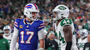 Buffalo Bills quarterback Josh Allen yells at New York Jets linebacker Jamien Sherwood after throwing a touchdown pass