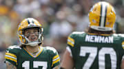 Aug 26, 2023; Green Bay, WI, USA; Green Bay Packers quarterback Alex McGough (17) talks with guard Royce Newman (70) following a false start penalty against the Seattle Seahawks during their preseason football game at Lambeau Field. Green Bay defeated Seattle 19-15. Mandatory Credit: Wm. Glasheen-Imagn Images